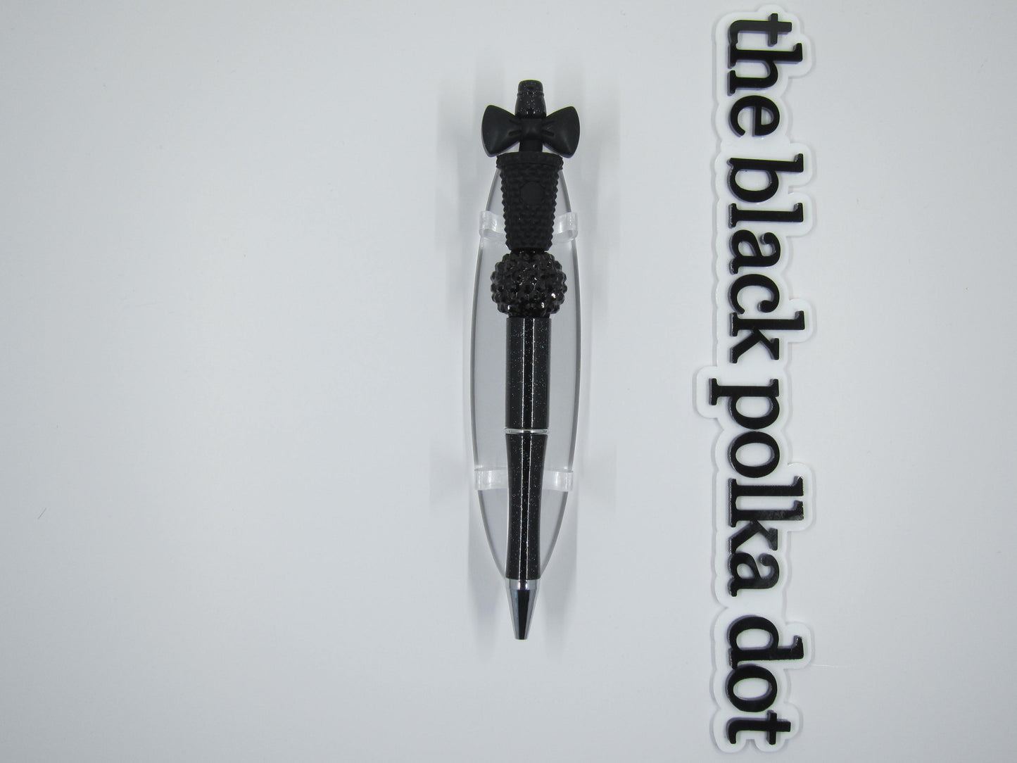 black studded cup with bow