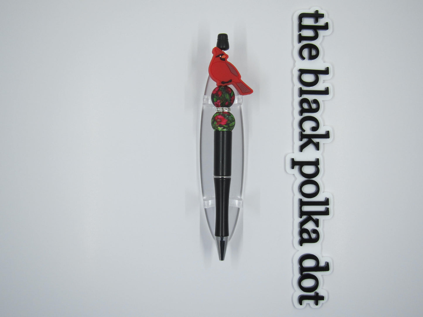 cardinal with poinsettias