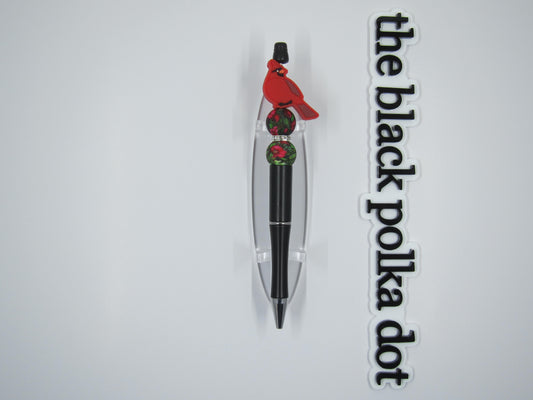 cardinal with poinsettias