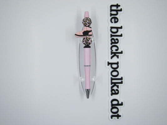 pink and black sneaker