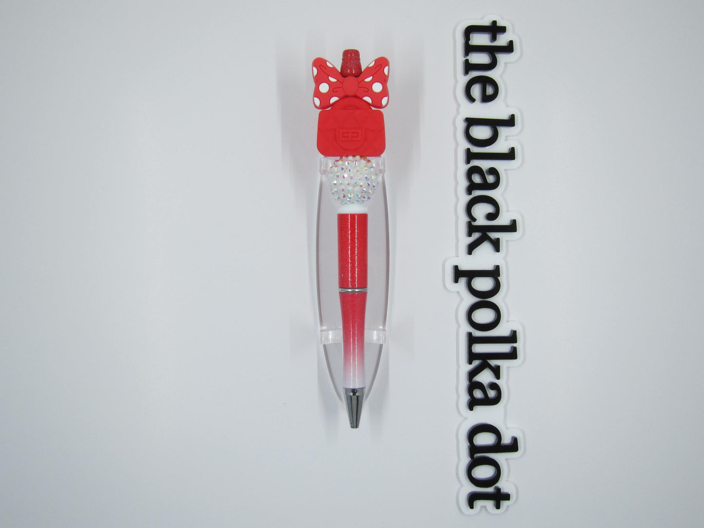 red polka dot bow and purse